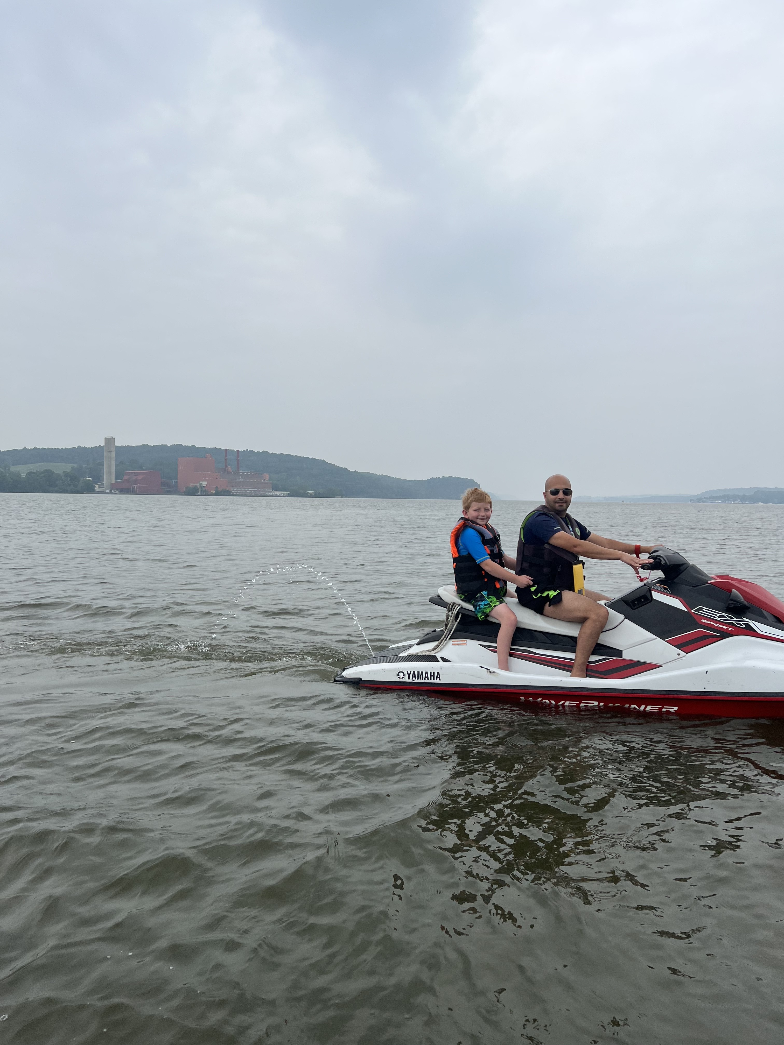 Father and child on a Yamaha WaveRunner jet ski on the Hudson River — best Father's Day gift idea New York, family jet ski experience Hudson Valley