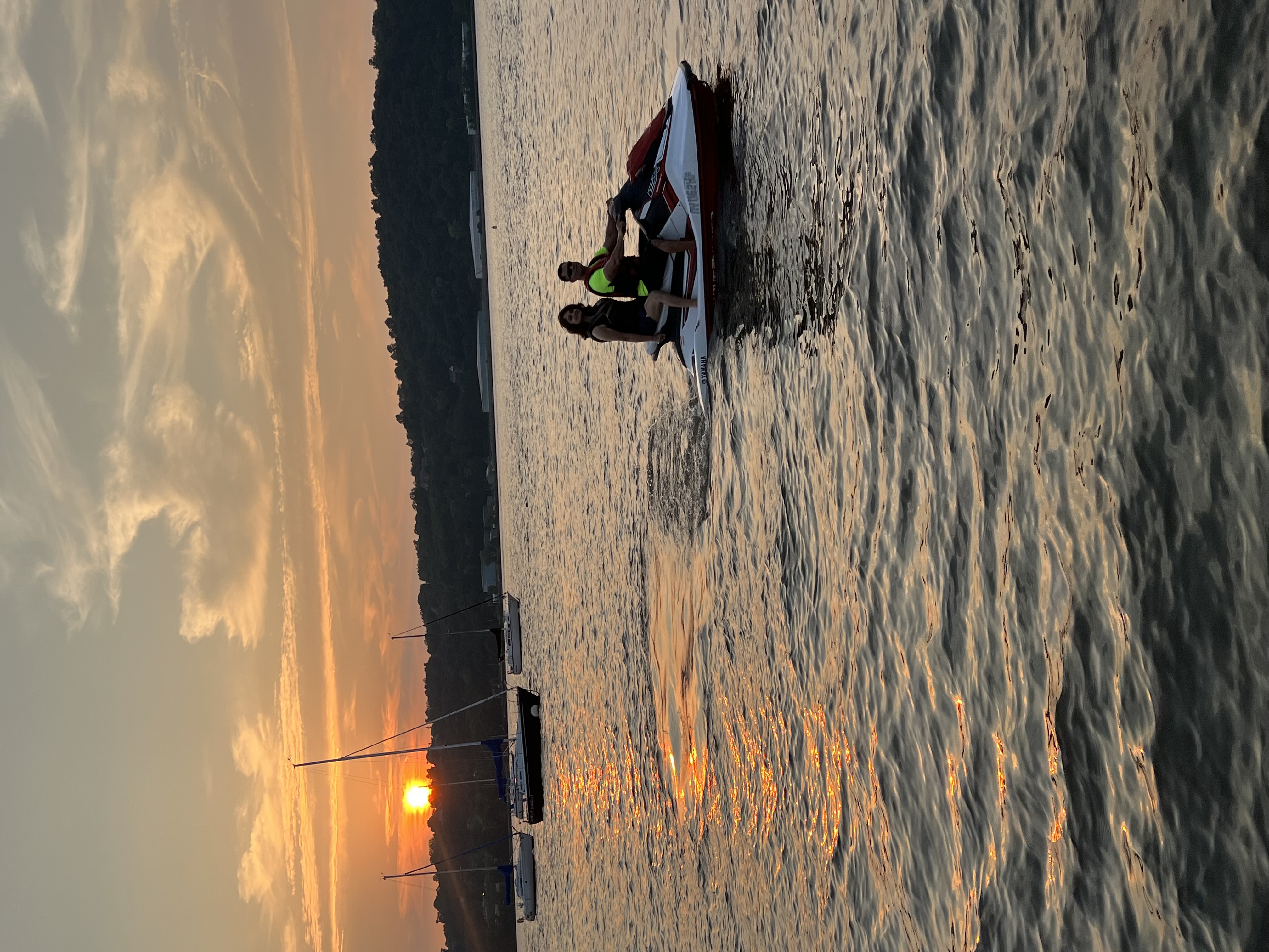 Couple on a Yamaha WaveRunner at sunset on the Hudson River — Jet Life Jet Skis Hudson Valley NY