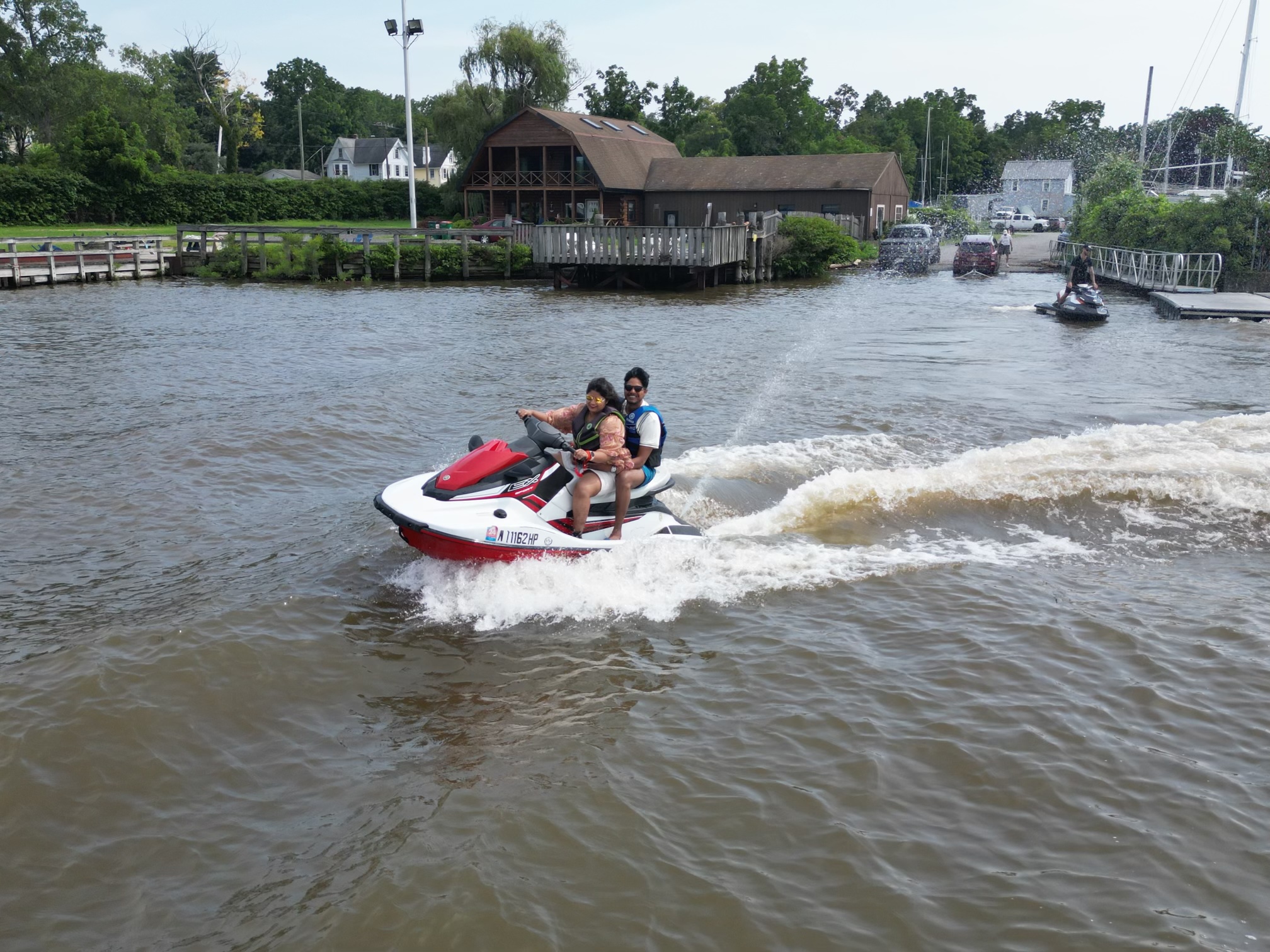 Two jet skis leaving the marina on the Hudson River — group jet ski rental Hudson Valley NY, water sports near NYC